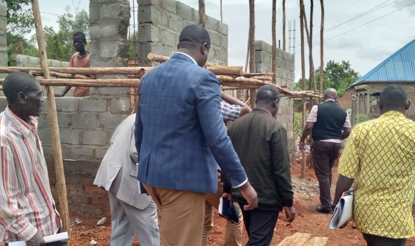 District Heads touring the Ward under construction at Buyobe HCIl